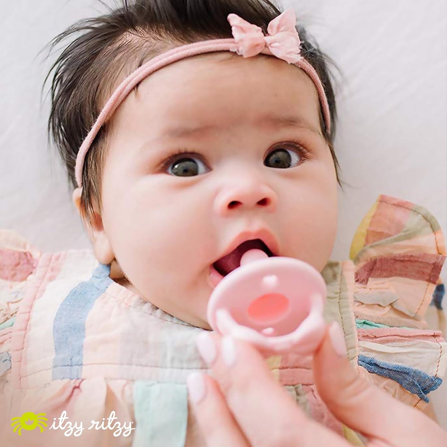 Itzy Ritzy Sweetie Soother™ - Pink Bows